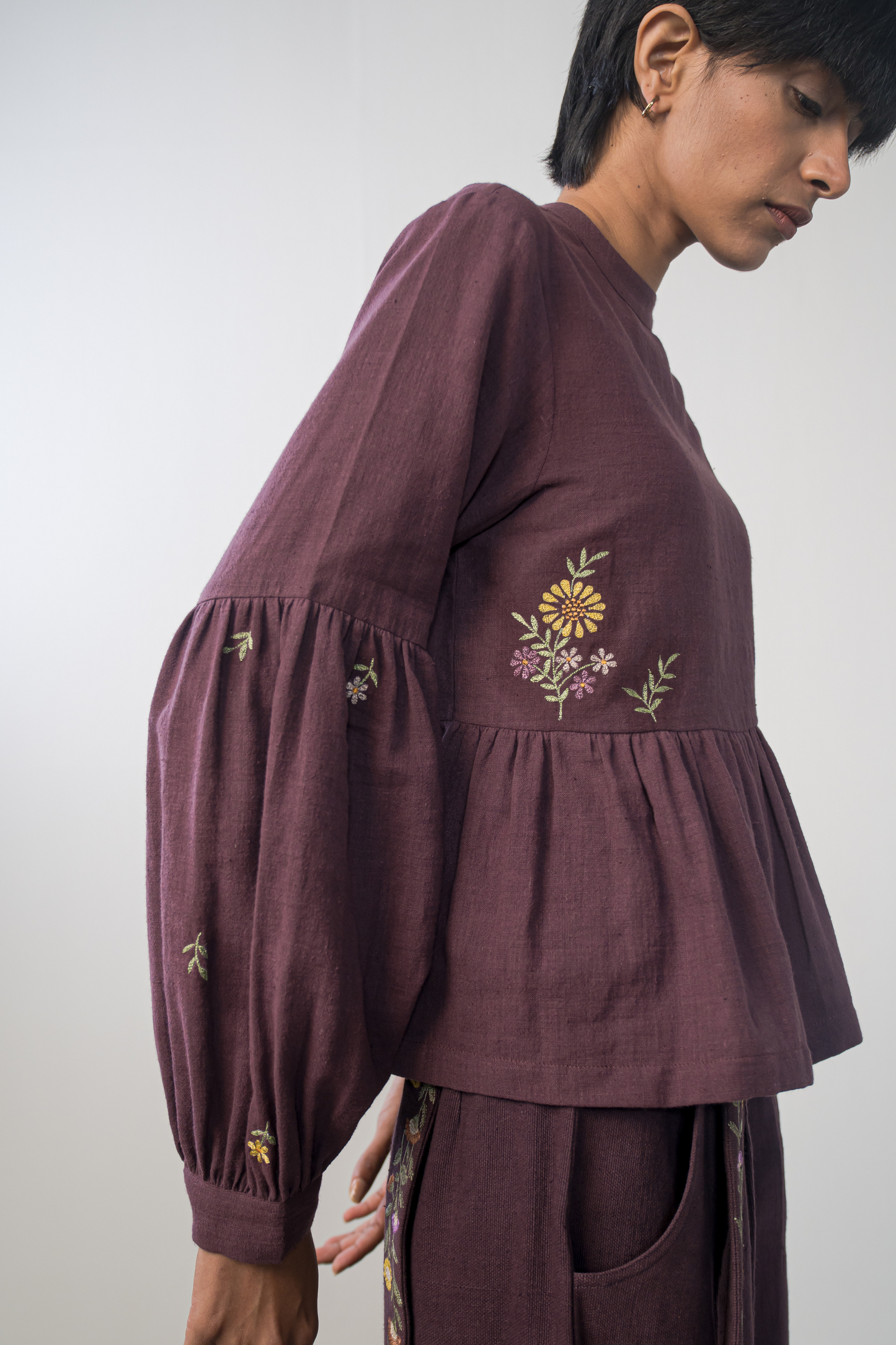 Midnight Bloom handwoven organic cotton peplum top