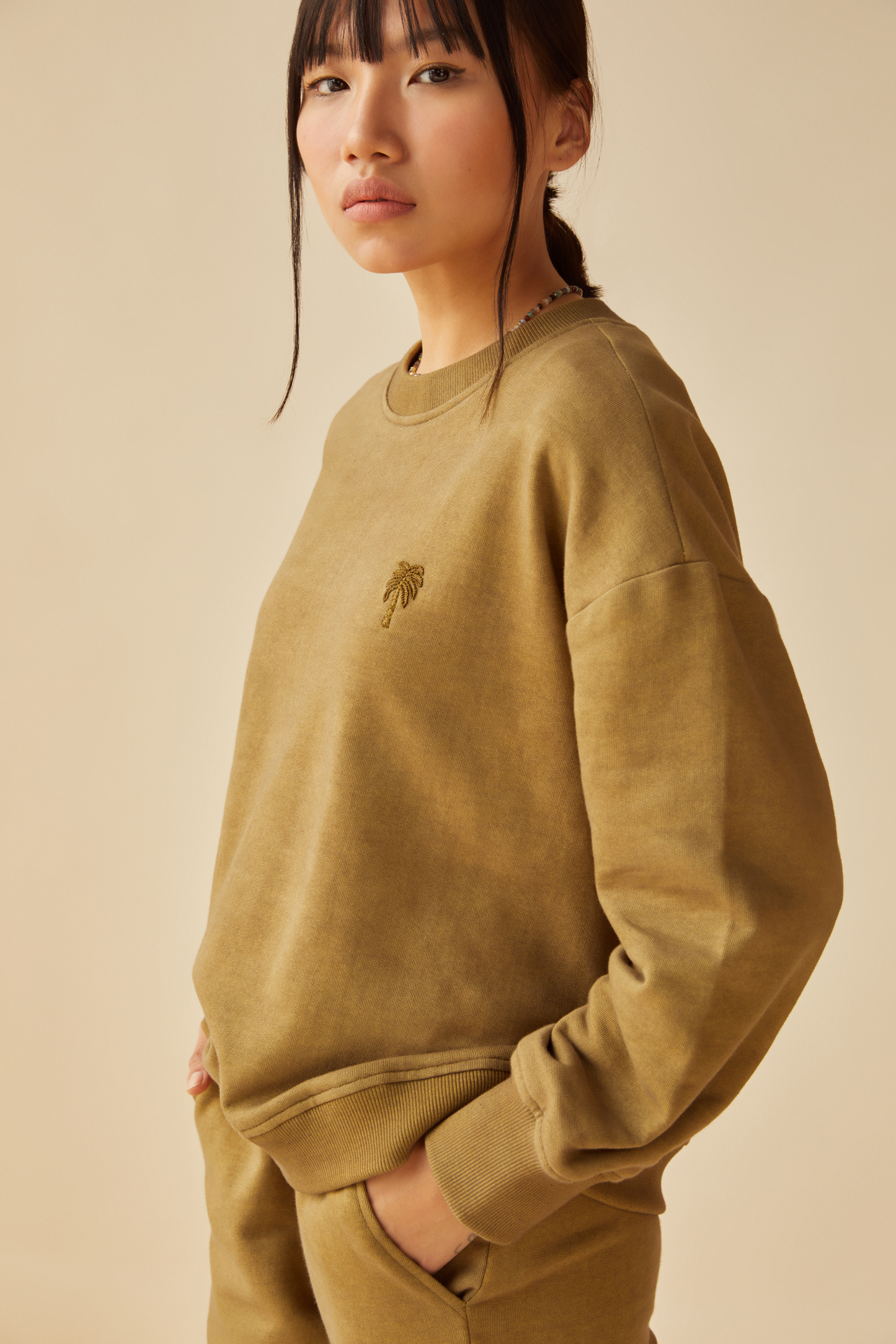 The Palmy olive organic cotton terry jumper