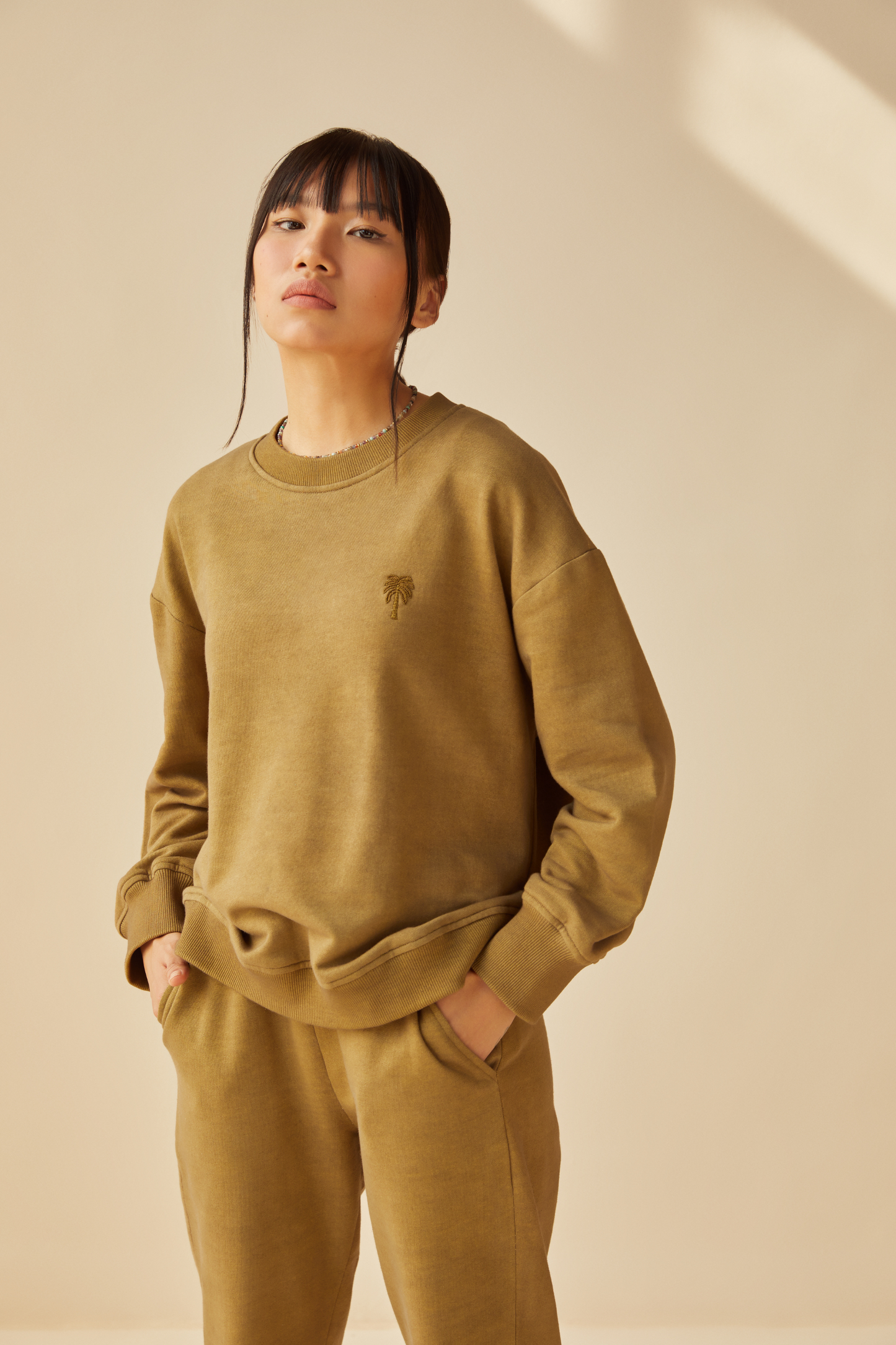 The Palmy olive organic cotton terry jumper