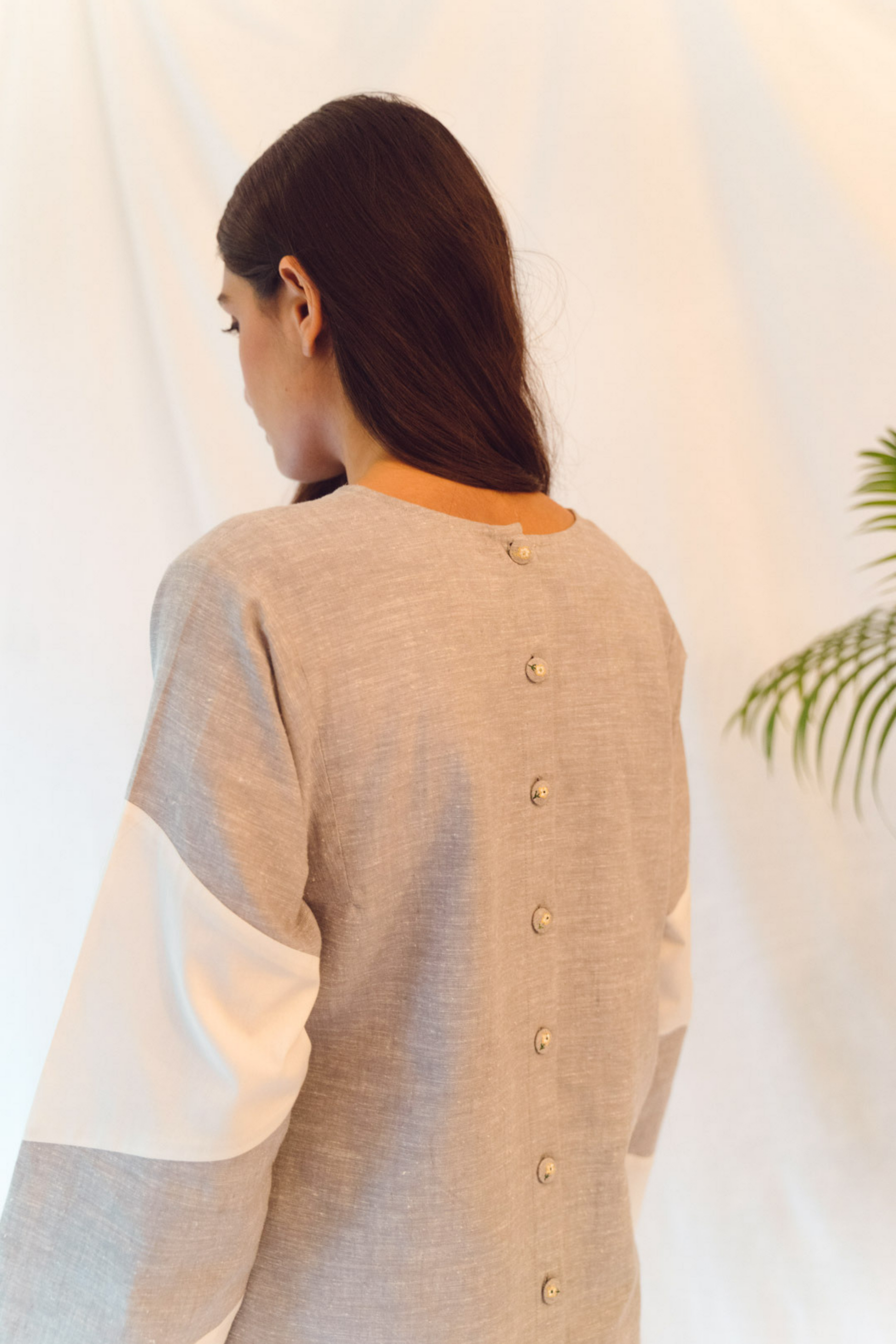 Sui | THE CORNER embroidered long top crafted in hemp with organic cotton detailing from Flow Winter Collection 2019