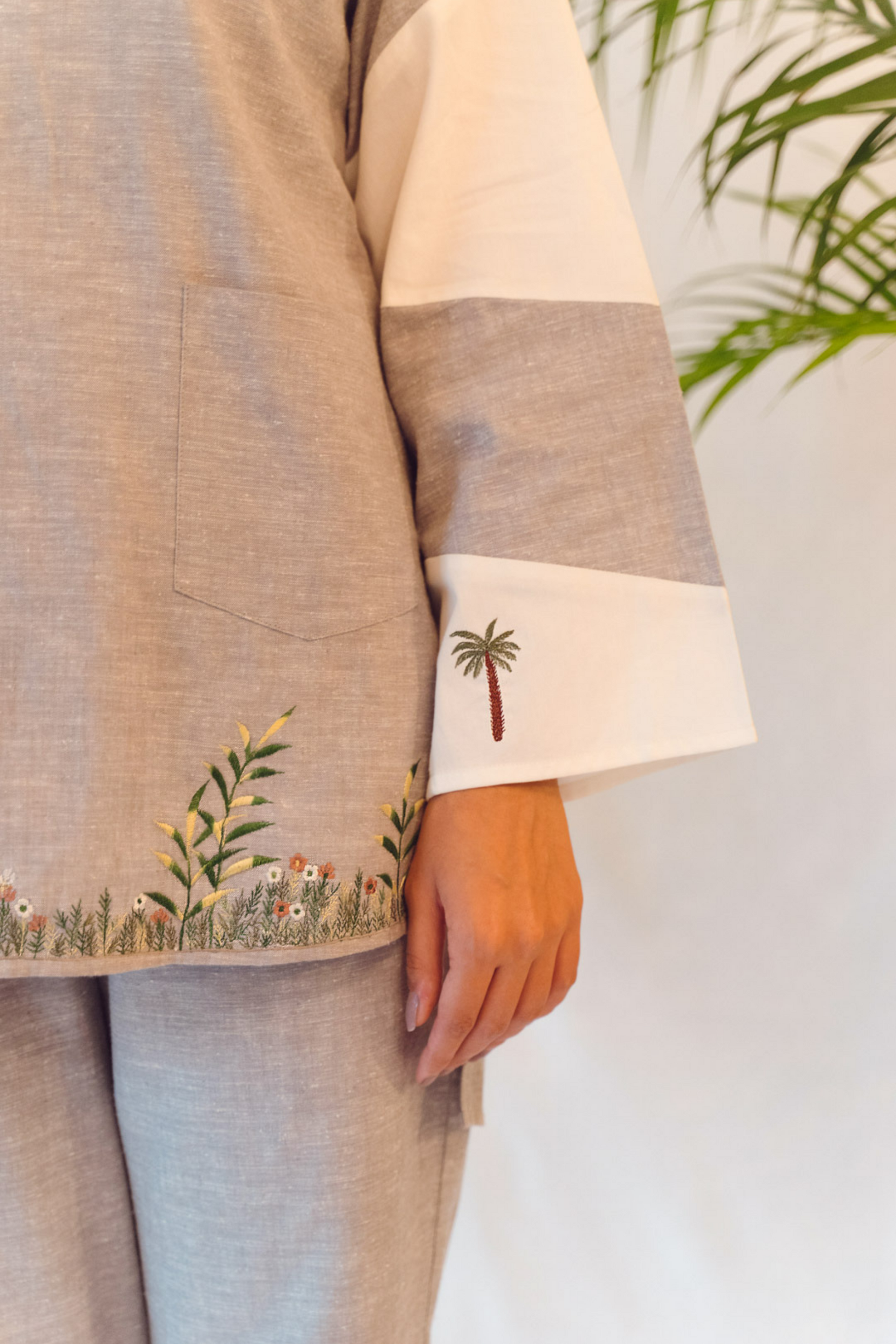 Sui | THE CORNER embroidered long top crafted in hemp with organic cotton detailing from Flow Winter Collection 2019